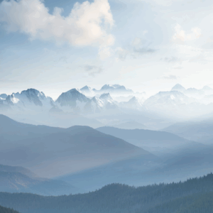 Mountain range with mist and clouds.